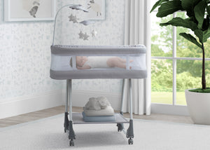 Shooting Star Rocking Bassinet with Air Flow Mesh Delta Children